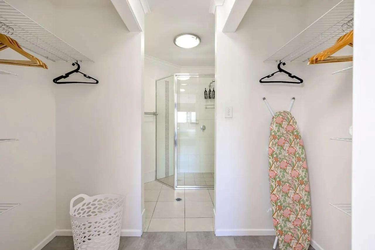 The Vibrant Tropics - Cairns' Palm-Lined Paradise Apartment